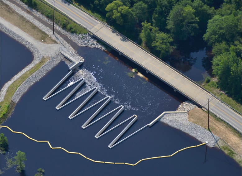 Aerial of completed dam project at Rhodes Pond