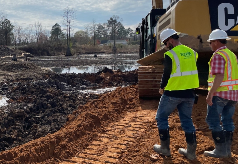 Earthwork stages of a dam construction project